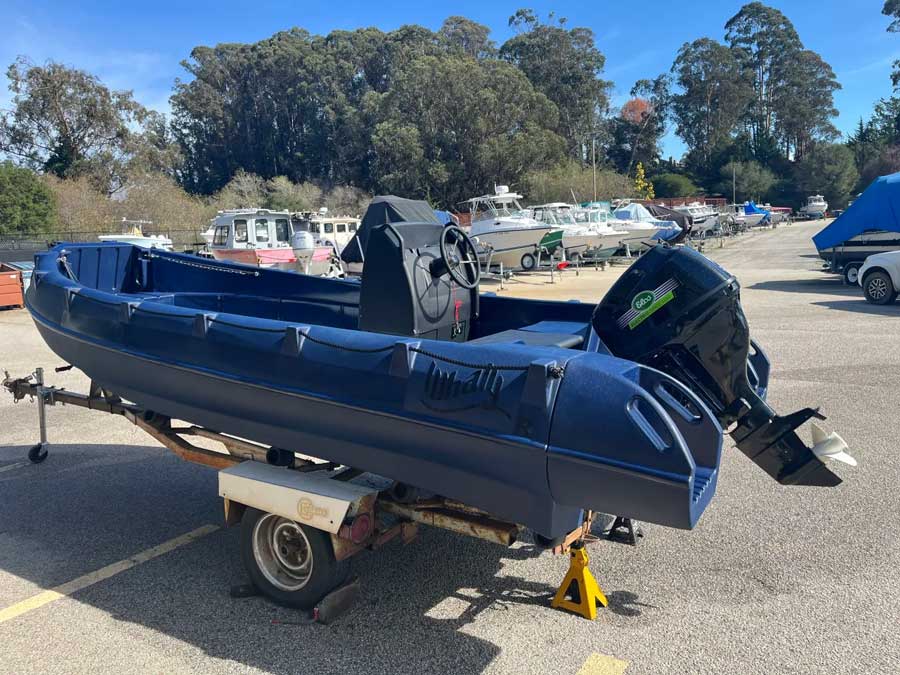 Whaly boat in blue on a trailer at Monterey Bay Marine